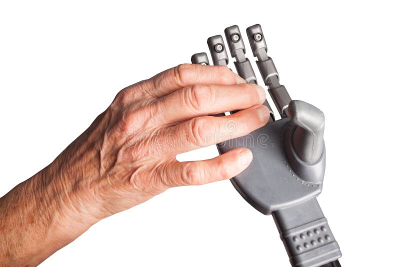 Senior female`s hand holding an artificial hand. Black robots stock images, royalty-free photos and pictures