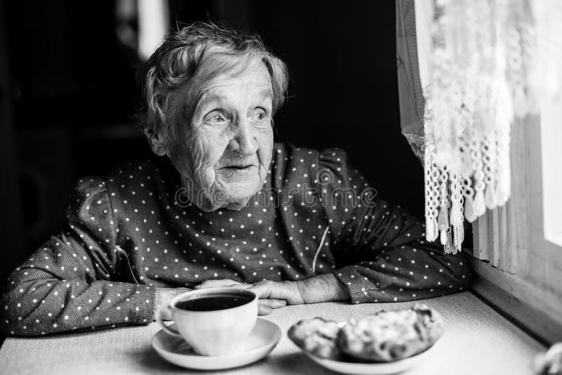 Old Lady Drinking Coffee