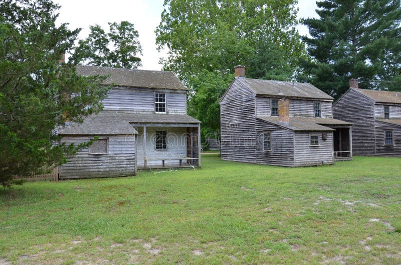 Old Wood Ghost Town Homes or Cabins with Grass Stock Photo Image of