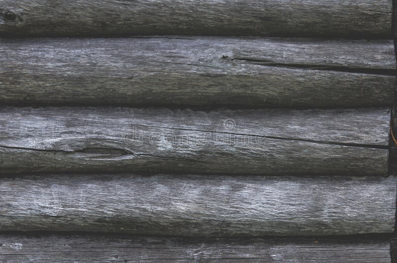 Old wooden beam. The wall of a wooden house. Rustic wooden log house stock images, royalty-free photos and pictures