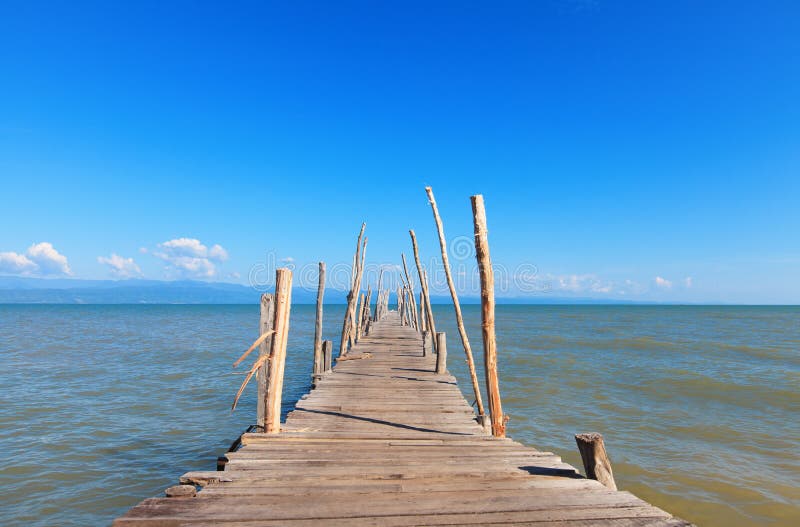 Old Wooden Boat Dock, Going Far Out To Sea. Stock Image ...