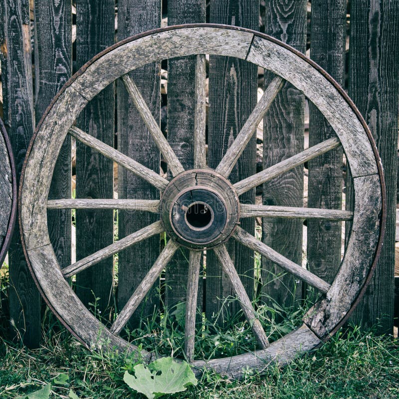 Old Wooden Cart Wheel stock photo. Image of background - 88447946