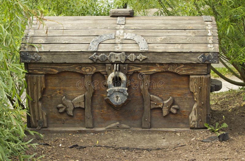 An Old Chest with a Lock Stands on a Tree Stump Stock Image Image of
