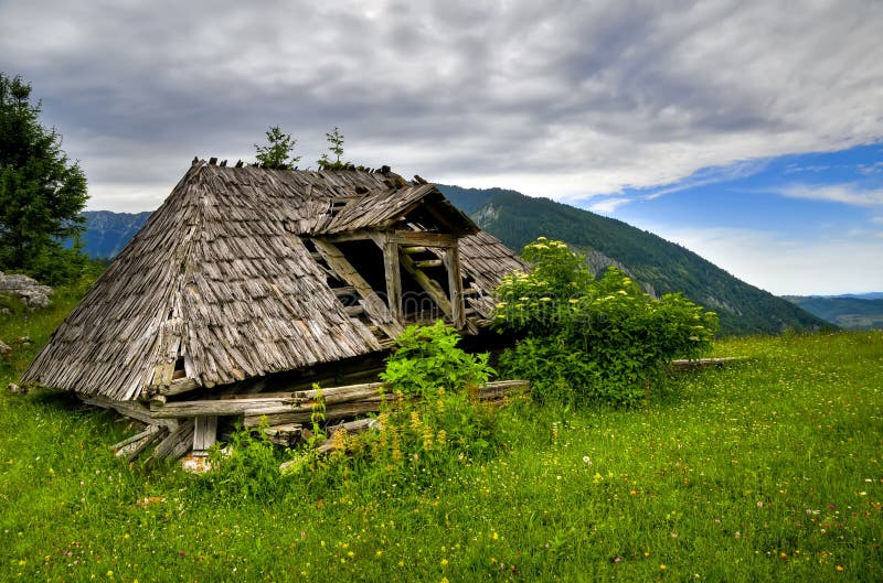 Old wooden cottage royalty free stock photos