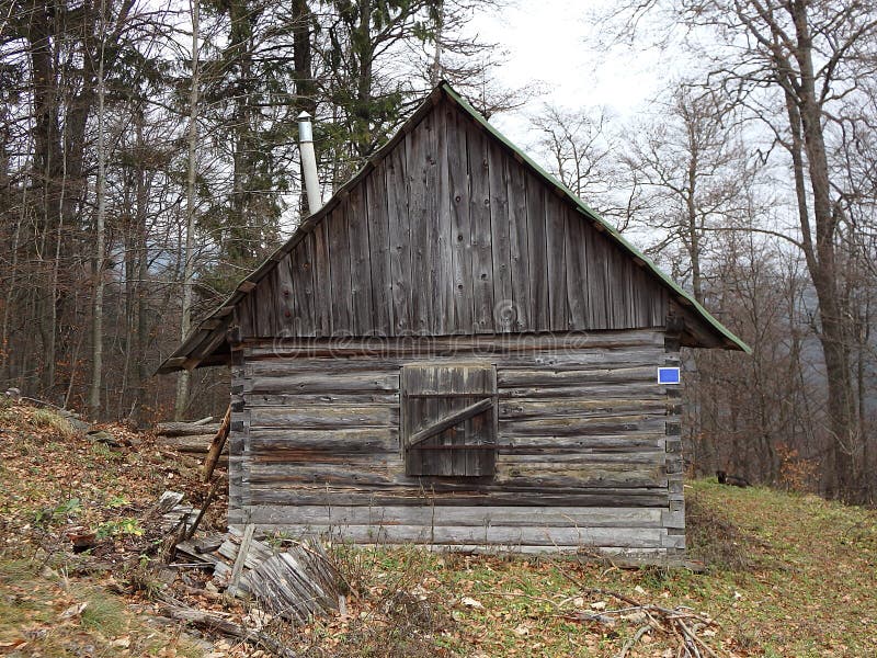 Old wooden cottage in the mountains