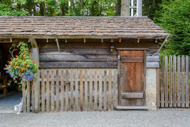 Old wooden fence with flowers