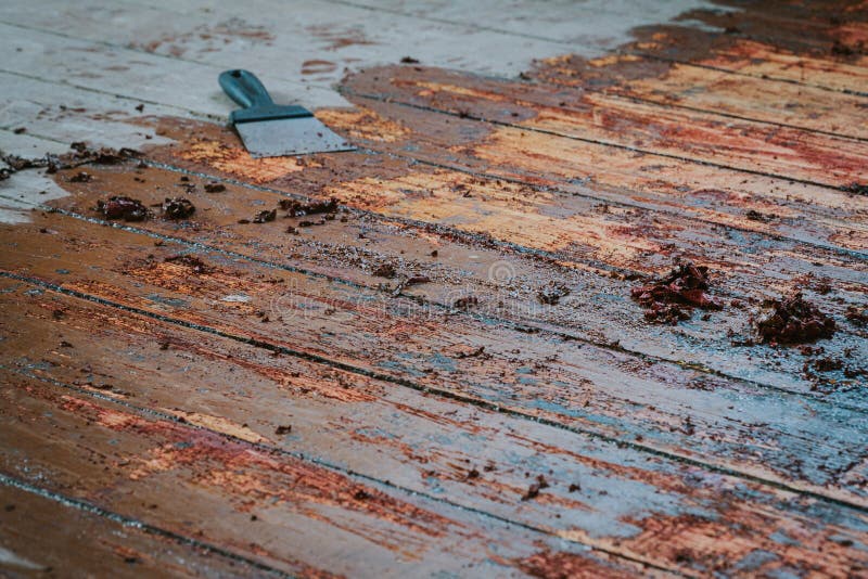 Old Wooden Floor And Scraper Tool With Paint Scraped Stock Image