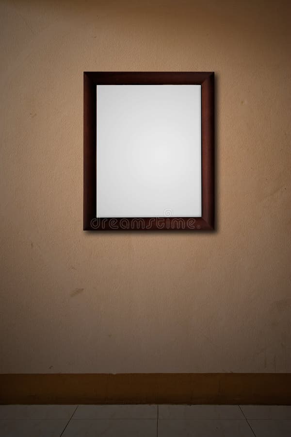 Old wooden frame on pink wall