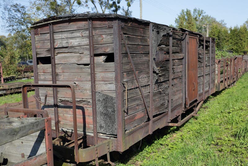 Old wooden freight wagon. Part of destroyed train royalty free stock photography
