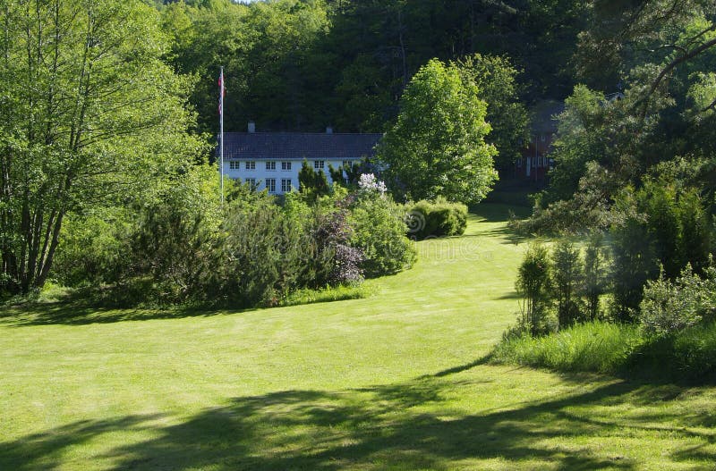 Old, wooden house in big garden