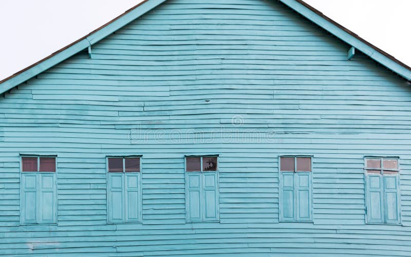 The old wooden house Painted bright blue stock photos The old wooden house Painted bright blue stock photos