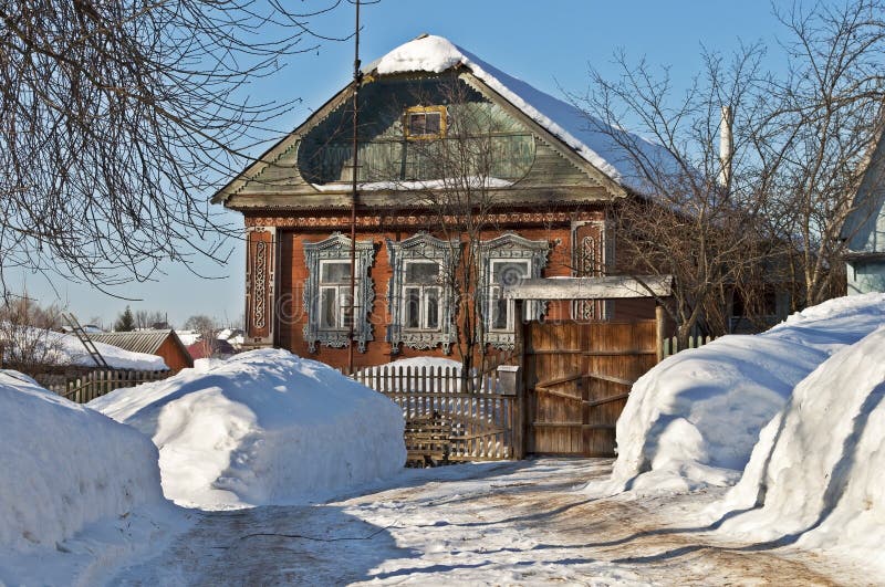 Small wooden house in winter