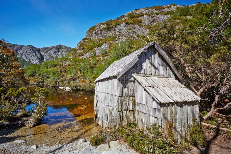 Old wooden hut by lakeside in Cradle Mountain Lake St. Clair Nat