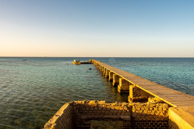 Old wooden pier jetty of the Sanganeb Reef Lighthouse near Port Sudan, on the Red Sea, in Sanganeb National Park