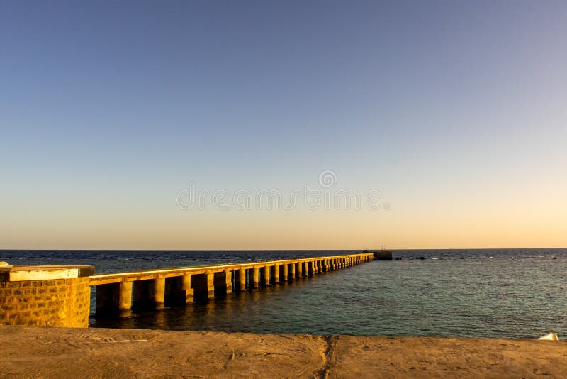 Old wooden pier jetty of the Sanganeb Reef Lighthouse near Port Sudan, on the Red Sea, in Sanganeb National Park
