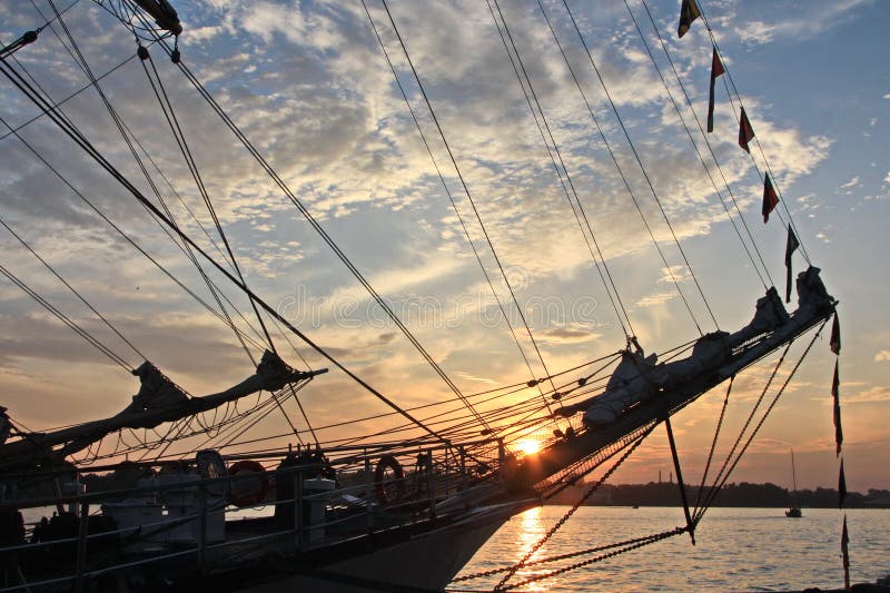Old wooden ship at sunset stock photo Old wooden ship at sunset stock photo