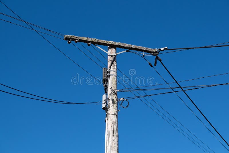 Old wooden telephone or power pole