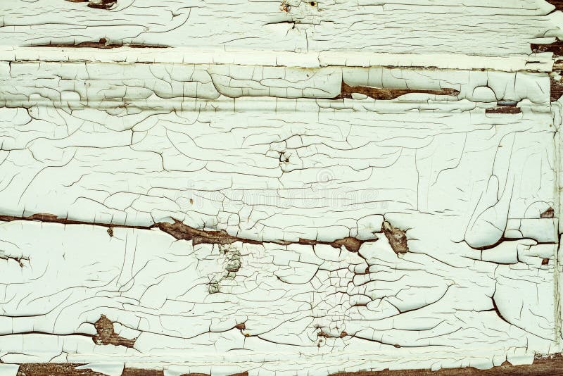 Old wooden wall with old peeled-off paint