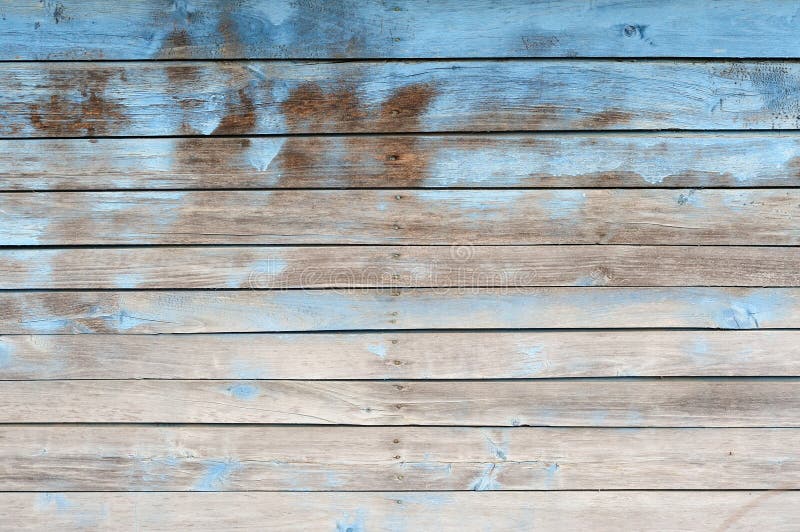Old wooden wall painted blue background