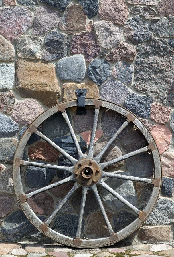 Old Wooden Wheel Placed Near Wall Stock Photos - Free & Royalty-Free ...