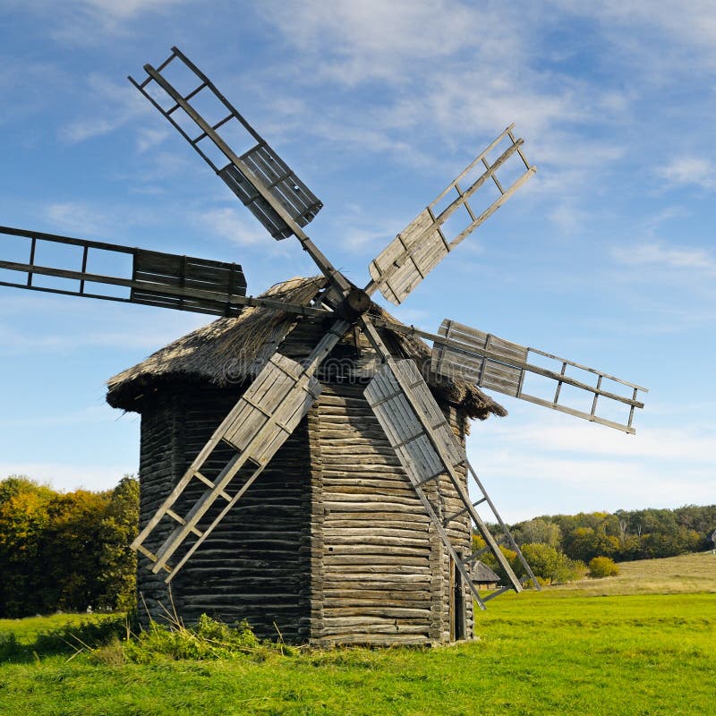 Old Wooden Windmill in Field Stock Image - Image of background, cloud