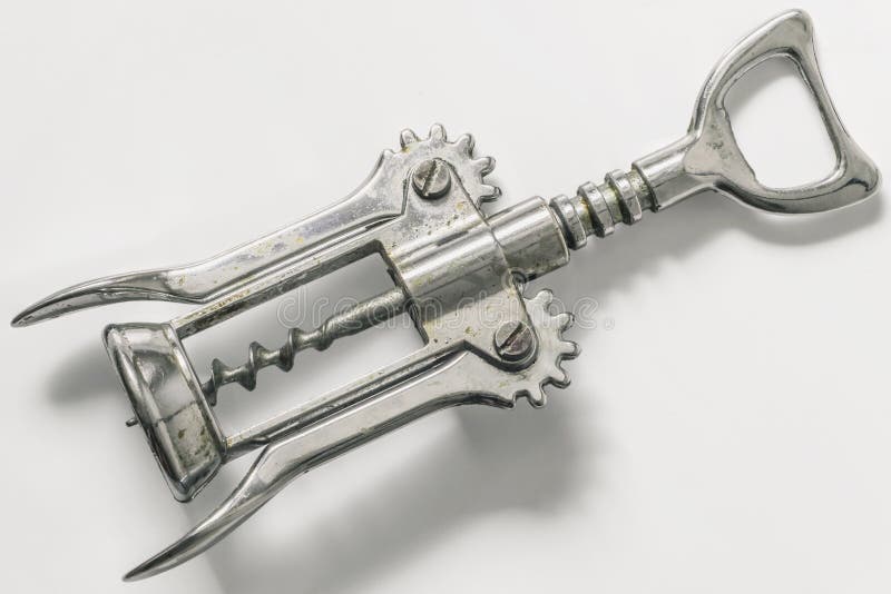 Old Worn Chrome Plated Wing Corkscrew on Set White Backdrop Stock Image
