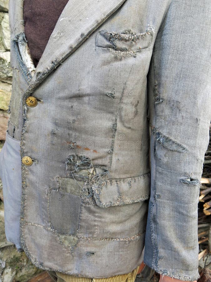 Old Worn And Shabby Jacket Used By The Farmer In The Countryside Stock