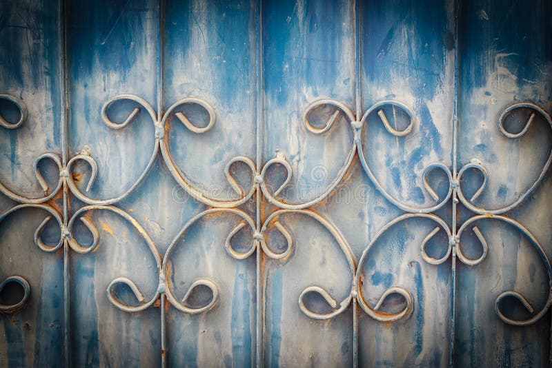 Old wrought iron bars on the gate with grunge and rusty steel b royalty free stock photos Old wrought iron bars on the gate with grunge and rusty steel b royalty free stock photos
