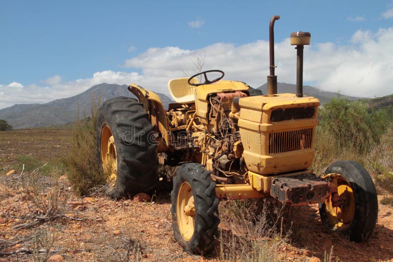 An old yellow tractor