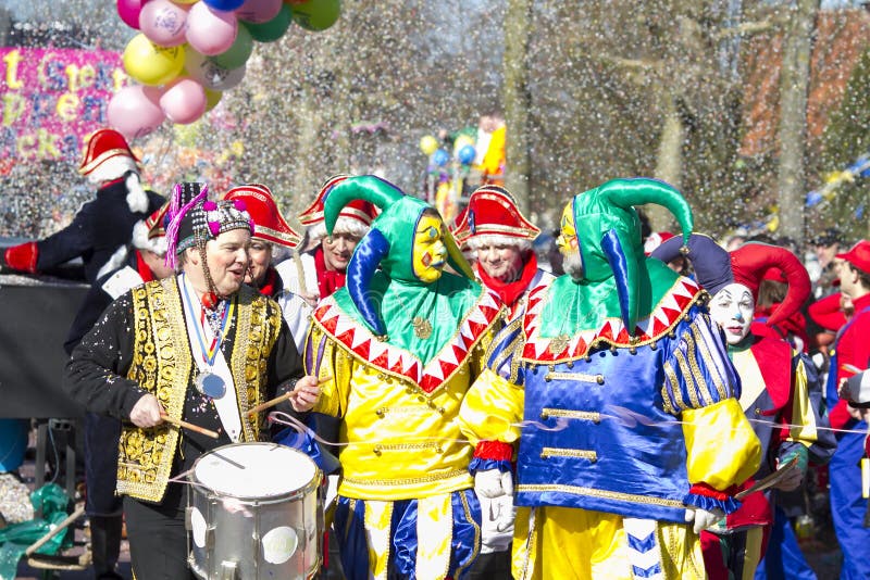 OLDENZAAL, NETHERLANDS - MARCH 6, 2011: People in colourful carnival dress during the annual carnival parade in Oldenzaal, Nether royalty free stock photo OLDENZAAL, NETHERLANDS - MARCH 6, 2011: People in colourful carnival dress during the annual carnival parade in Oldenzaal, Nether royalty free stock photo