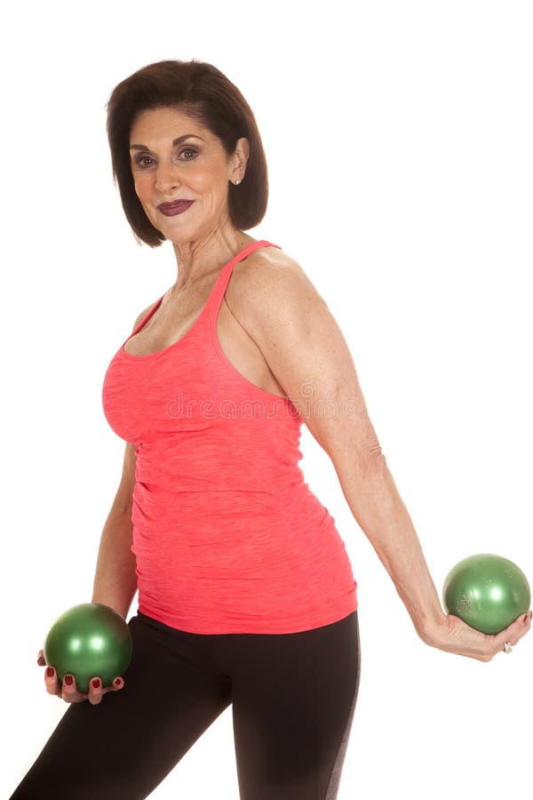 Older woman green balls fitness look