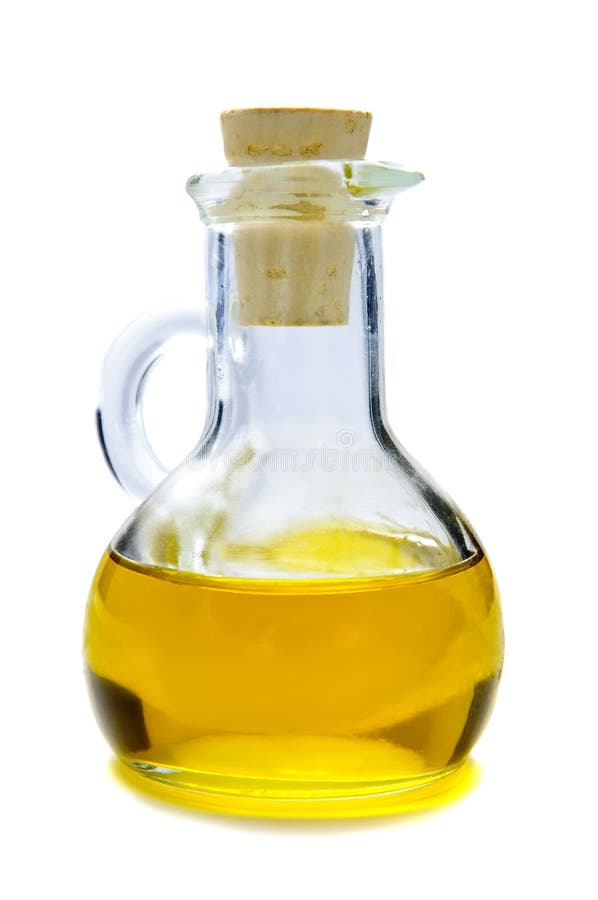 Glass of olive oil on a white background. Glass of olive oil on a white background