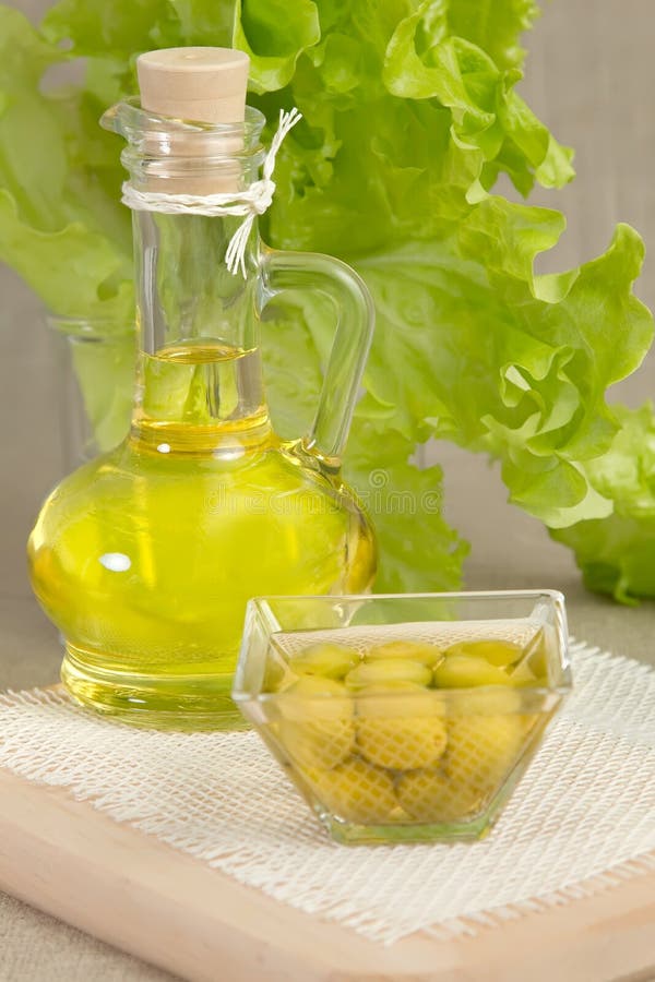 Olive oil being pouring stock photo. Image of closeup 10846982