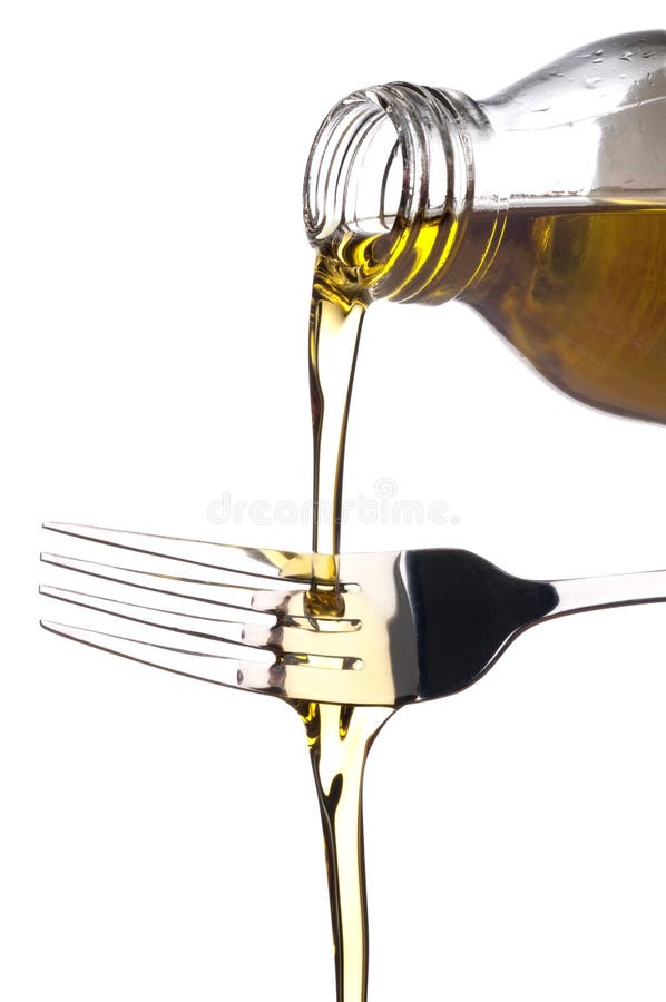 Olive Oil Being Poured Onto a Spoon Stock Photo Image of silverware