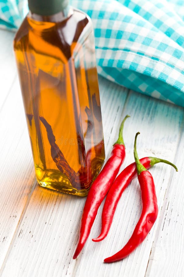 Olive Oil with Chili Peppers Stock Image Image of chilli, oliveoil 34054135