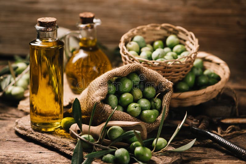 Olive Oil with Fresh Olives on Rustic Wood Stock Image Image of gold