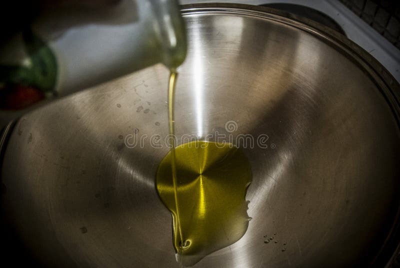 Olive Oil in a Pan stock photo. Image of action, ingredient 125503870