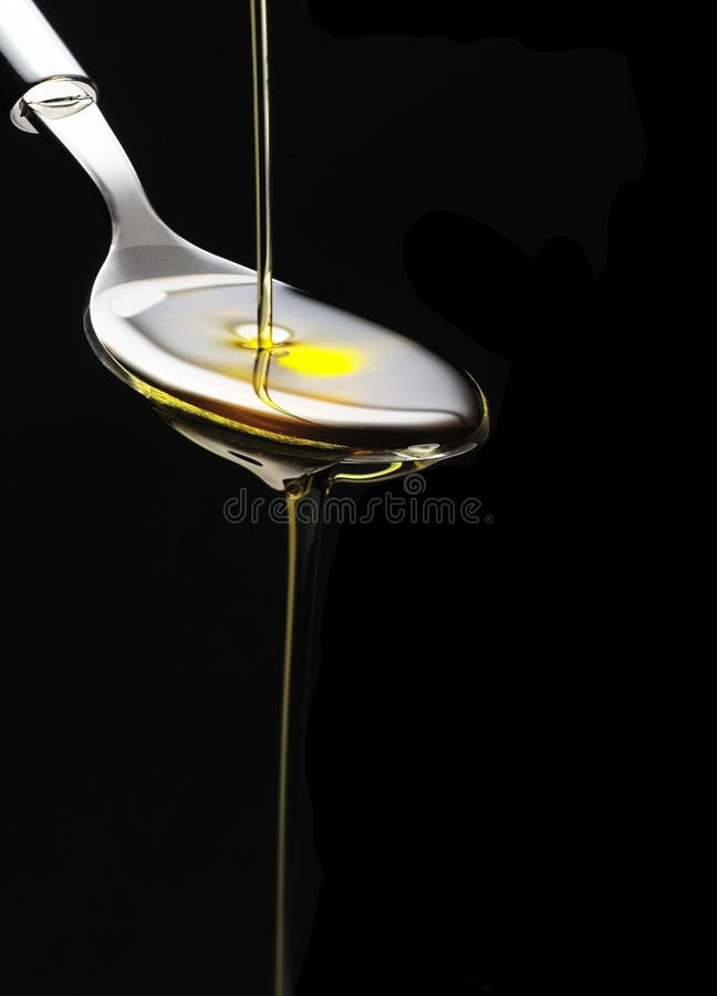 Olive oil on a spoon stock photo. Image of white, steel 16155742