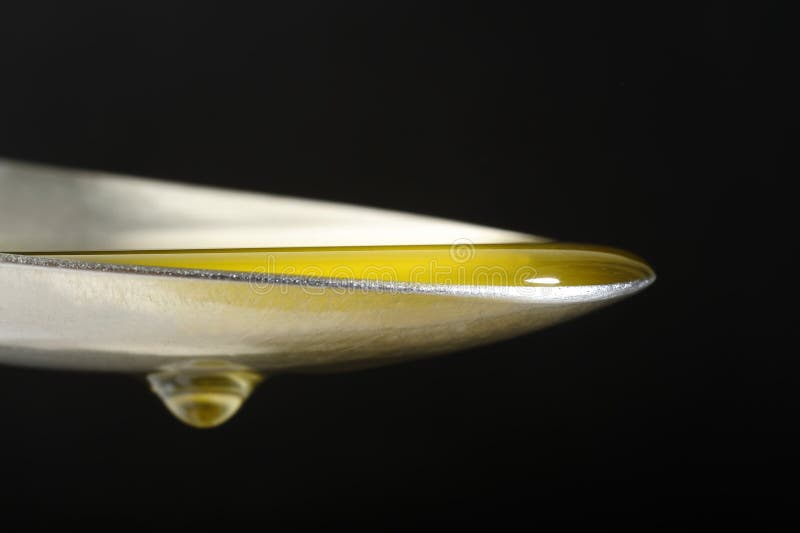 Olive oil in spoon stock image. Image of organic, cuisine 50825927