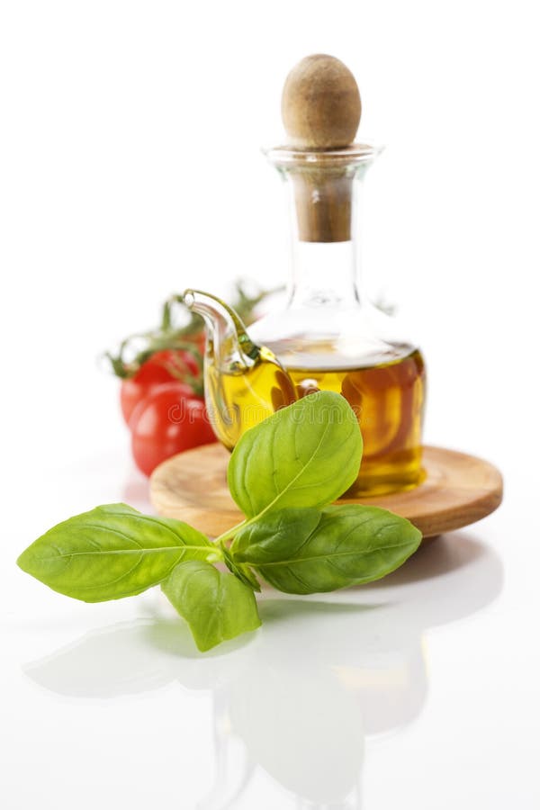 Olive oil and vegetables stock photo. Image of condiment 11541418