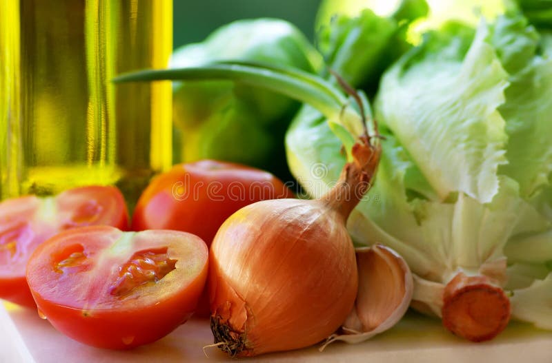 Olive oil and vegetables. stock image. Image of light 19952645