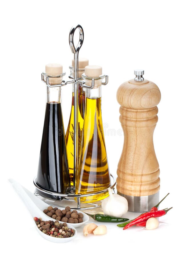 Olive Oil, Vinegar Bottles, Pepper Shaker and Spices Stock Photo