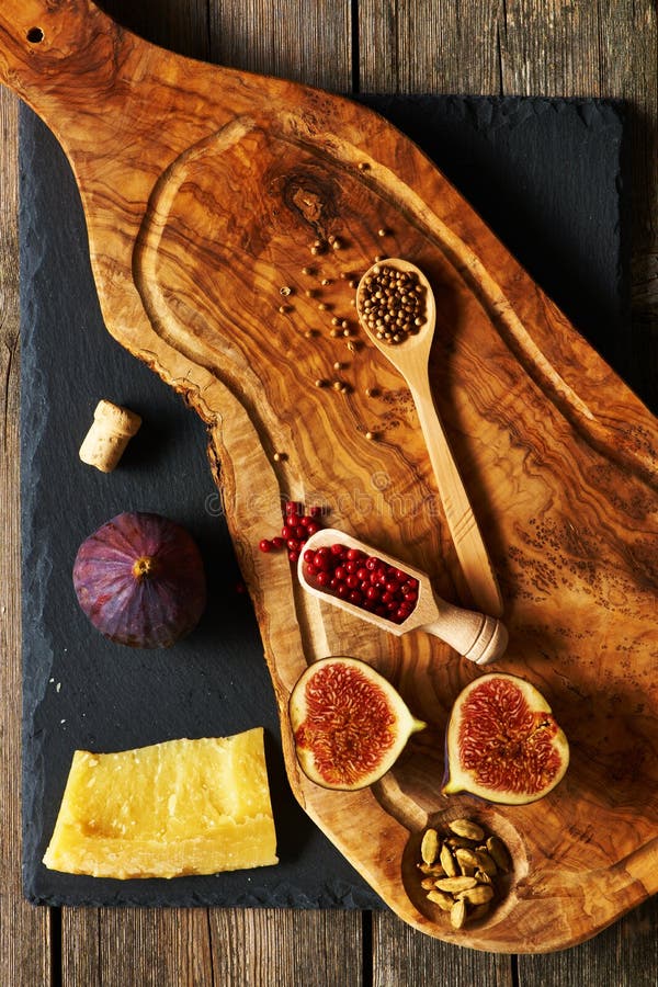Olive Wood Cutting Board with Spices and Fig Stock Image Image of