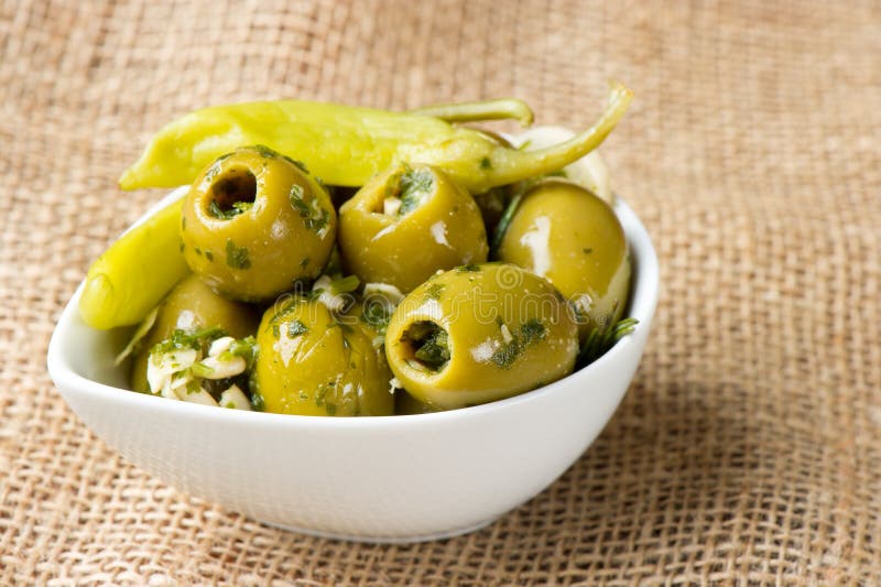 Olives with garlic stock image. Image of spices, meal 18814859