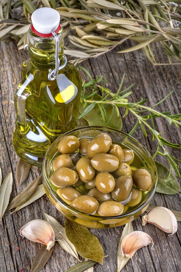 Olives in and olive oil stock photo. Image of diet, kitchen 58338626