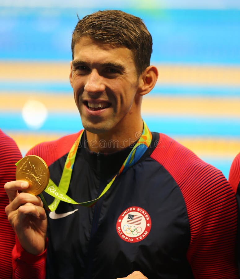 Olympic champion Michael Phelps of USA celebrates victory at the Men's 4x100m medley relay of the Rio 2016 Olympic Games stock photos Olympic champion Michael Phelps of USA celebrates victory at the Men's 4x100m medley relay of the Rio 2016 Olympic Games stock photos