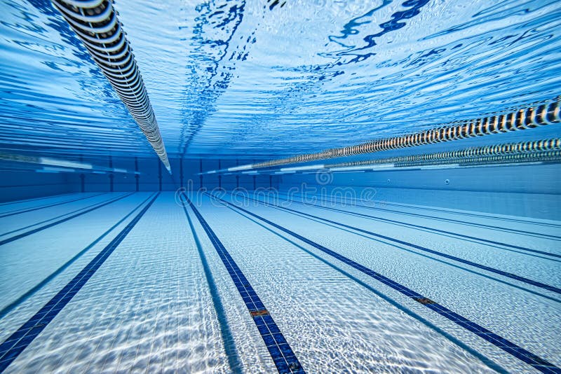 Olympic Swimming pool under water background royalty free stock photos