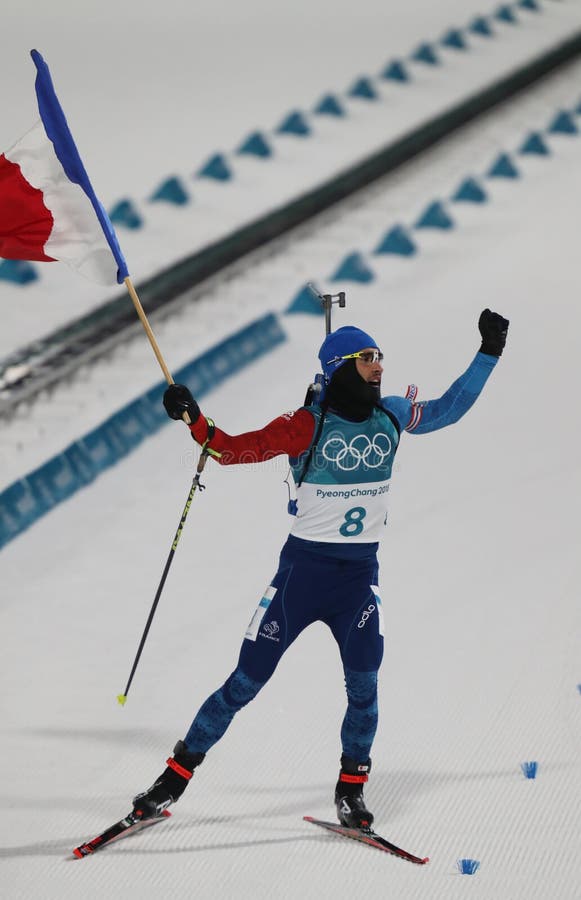 Olympischer Meister Martin Fourcade von Frankreich feiert Sieg in Biathlonmänner ` s 12 5km Verfolgung an den 2018 Winter Olympic stockbilder Olympischer Meister Martin Fourcade von Frankreich feiert Sieg in Biathlonmänner ` s 12 5km Verfolgung an den 2018 Winter Olympic stockbilder