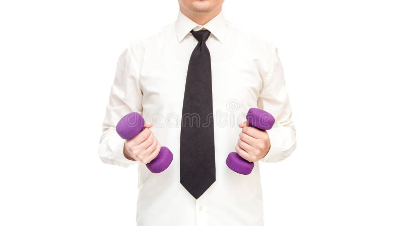 Om de afaceri de fațadă în cămașă albă cu cravată deține dumbbells în mâinile lui. stock photo
