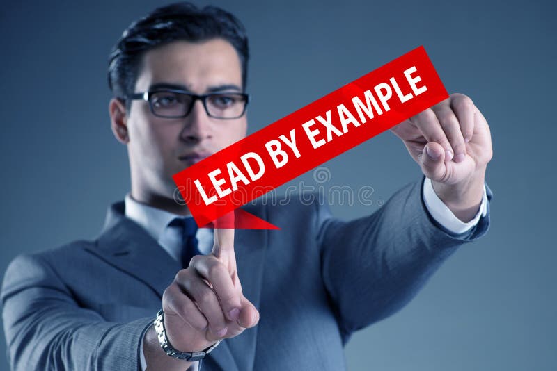 Om de afaceri în frunte după concept stock image